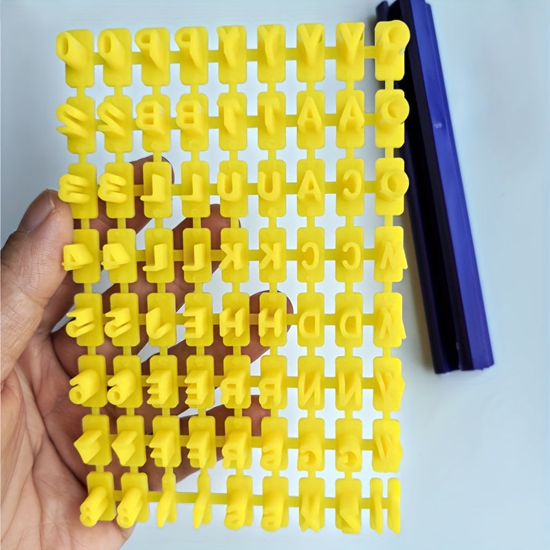 Yellow plastic grid with letters and numbers held by a hand on a white background