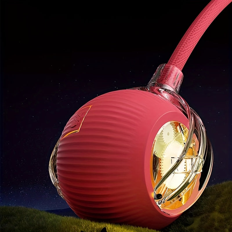 Red and gold golf ball with a light on a dark background