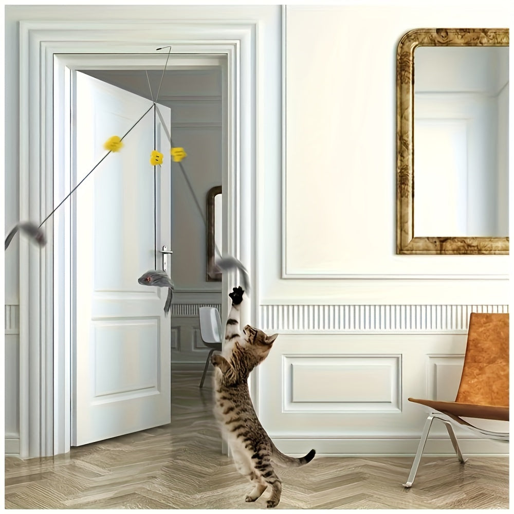 Cat playing with a toy in a stylish room with a mirror and chair.